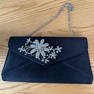 Elegant Black Clutch with Floral Embellishment